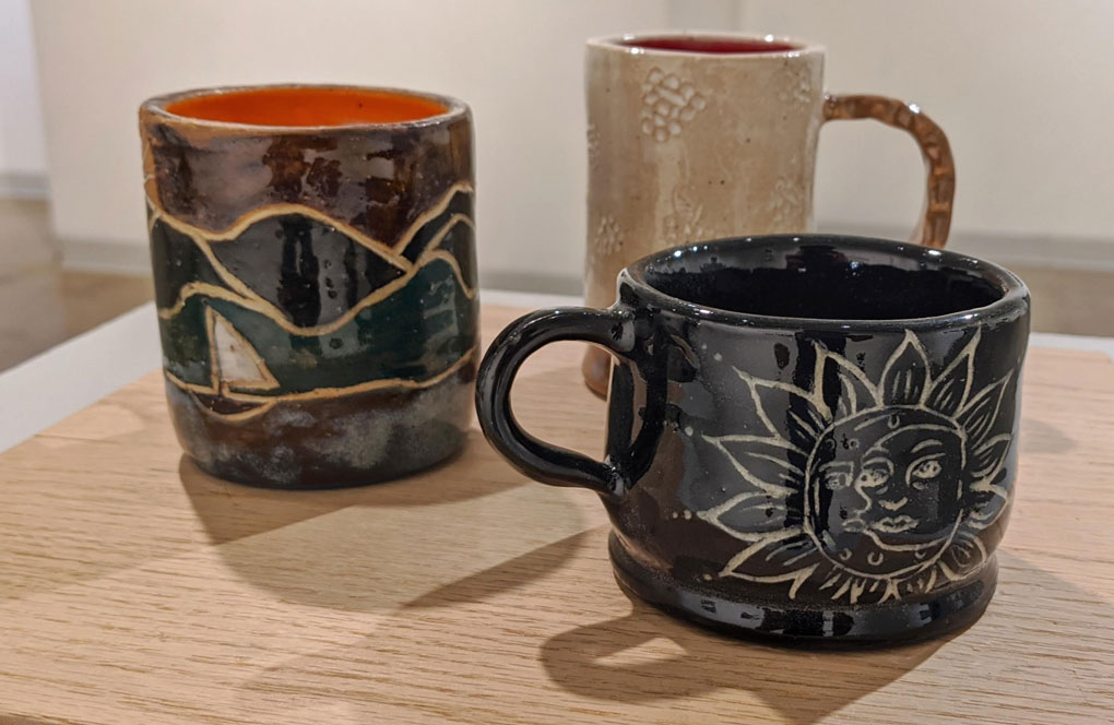 From left to right: Landscape, Berries, Sun and Moon - Stoneware clay 