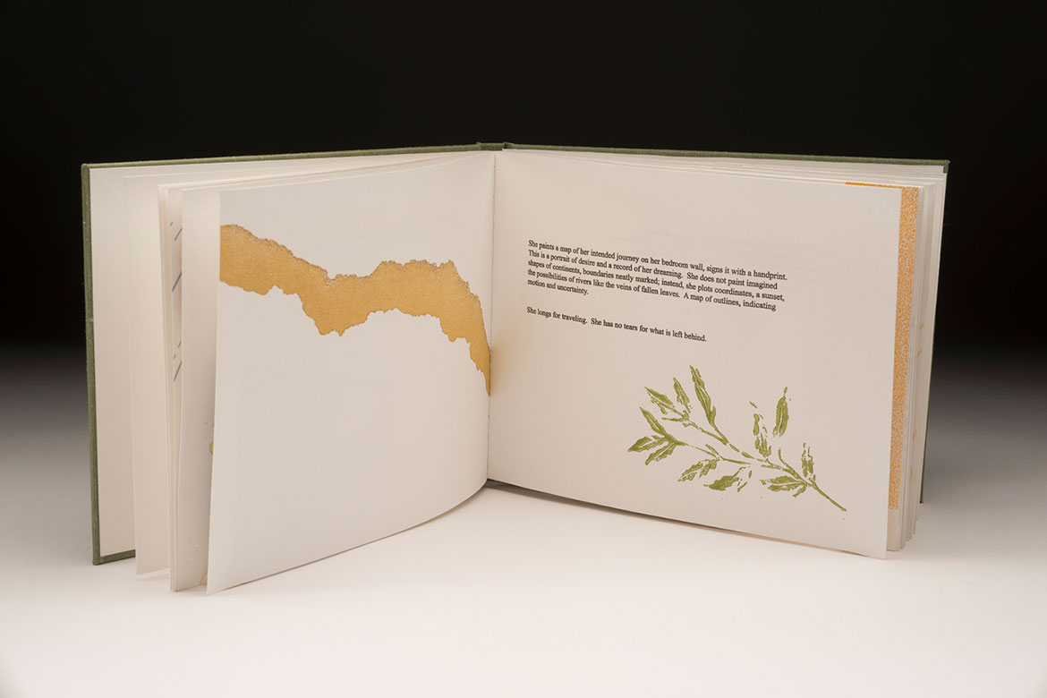 Inner pages of book displaying plants