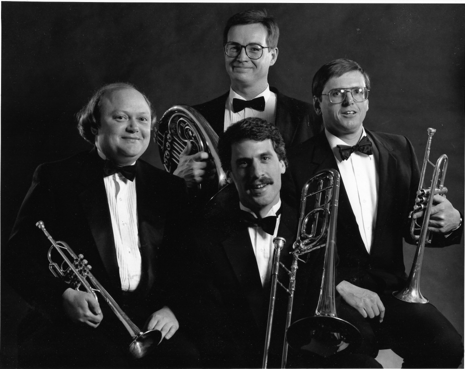 The Portneuf Brass Quartet (c. 1992): Dr. Randy Earles and Mr. Tom Banyas, trumpets; Mr. Craig Knutson, horn; Dr. Patrick Brooks, trombone