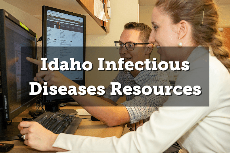 Image: Two people looking at and discussing something on a computer screen. Text: Idaho Infectious Disease Resources