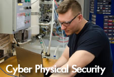 Cyber Physical Security Student working on servers