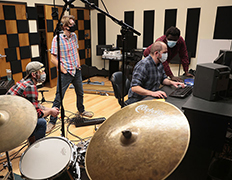 Commercial music students working in the studio - Come to ISU! Make an Album!