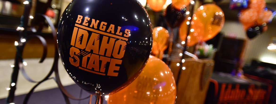 Graduation balloons with Black/Orange balloons with Bengals Idaho State lettering