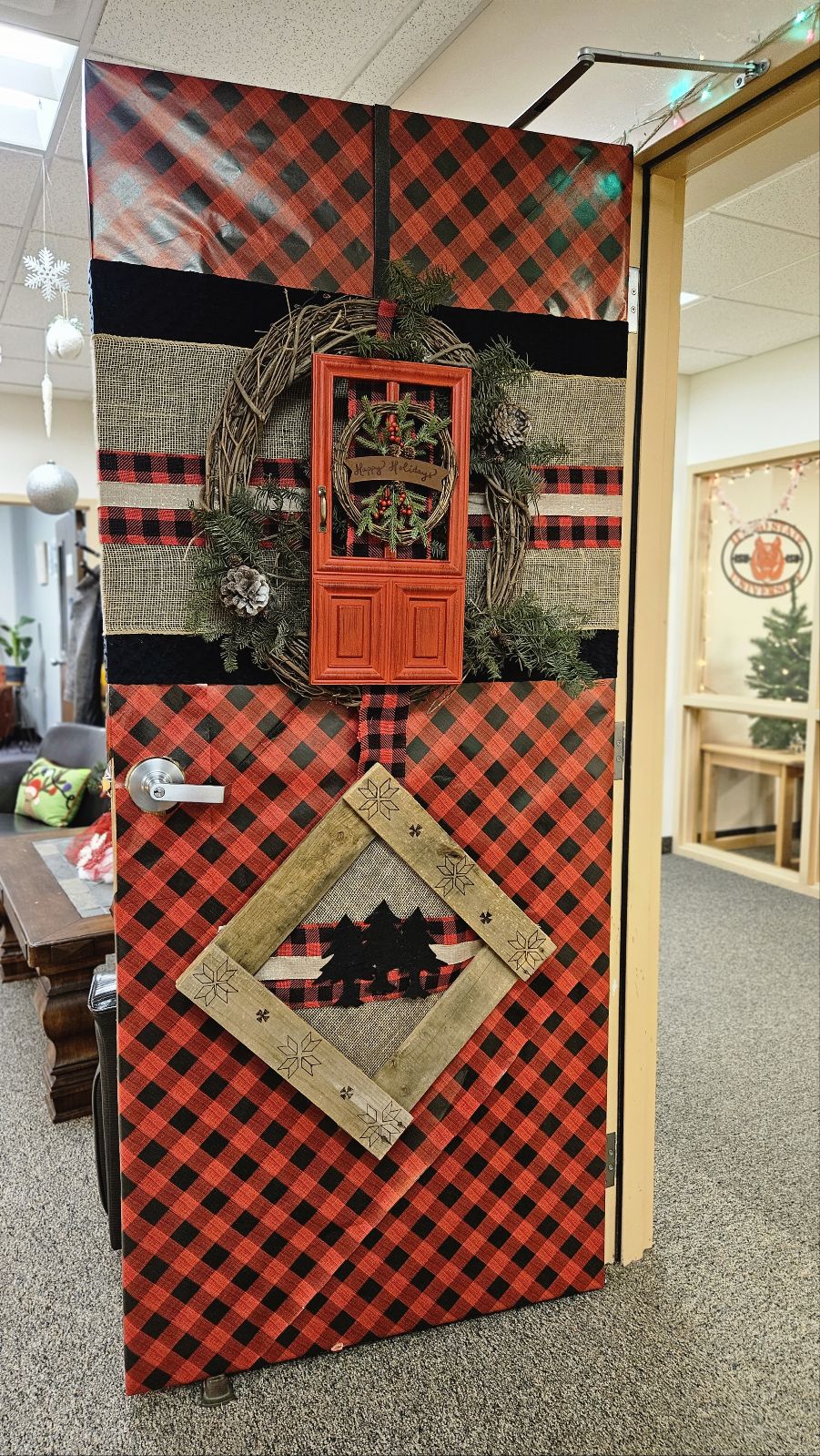 holiday door with red and black decorations