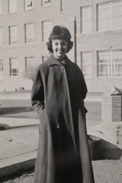 Judy Damewood in front of Chemistry building