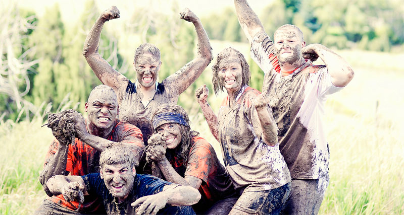 A mud covered team at the ambush race