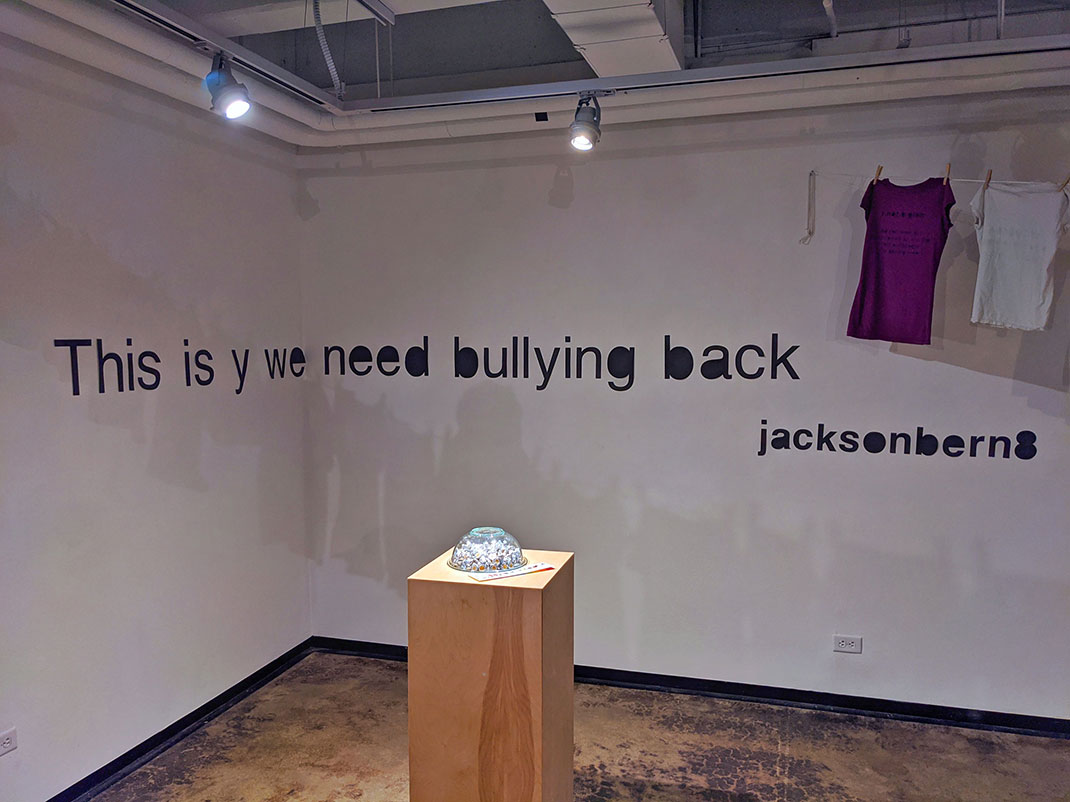 The back corner of the gallery, across which insulting comments have been displayed