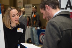 An employer and a student talking at a career fair