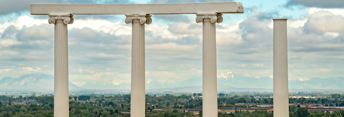 ISU pillars with Pocatello and the mountains in the background