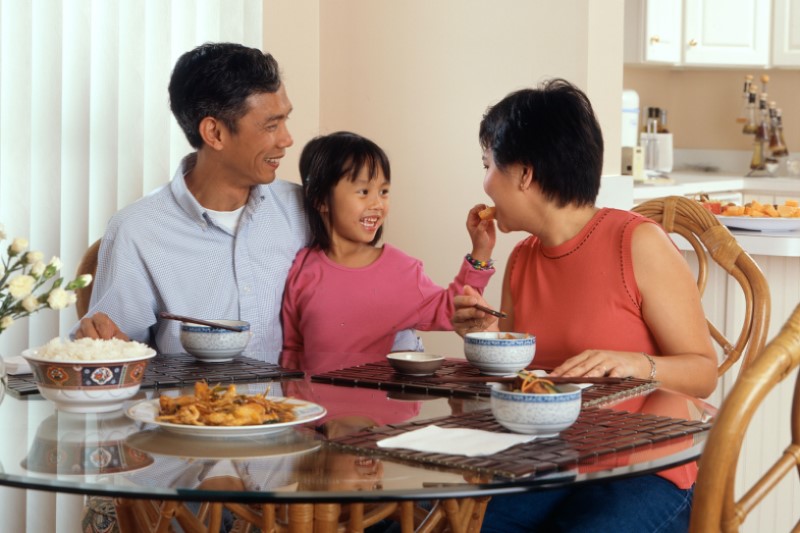 Phot of family eating dinner