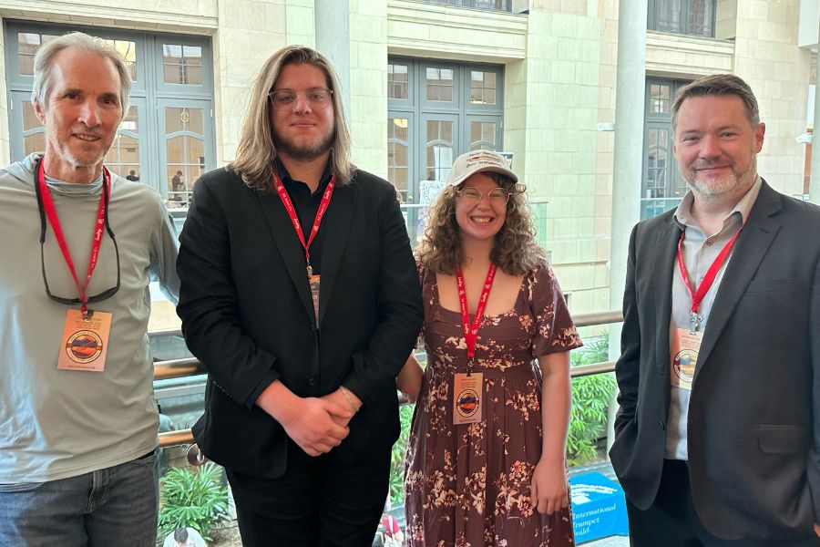 Group photo of Eddie's undergraduate (and life-long) mentor, Nick Norton (former Utah Symphony Principal Trumpet), with Caleb, Enid, and Eddie.