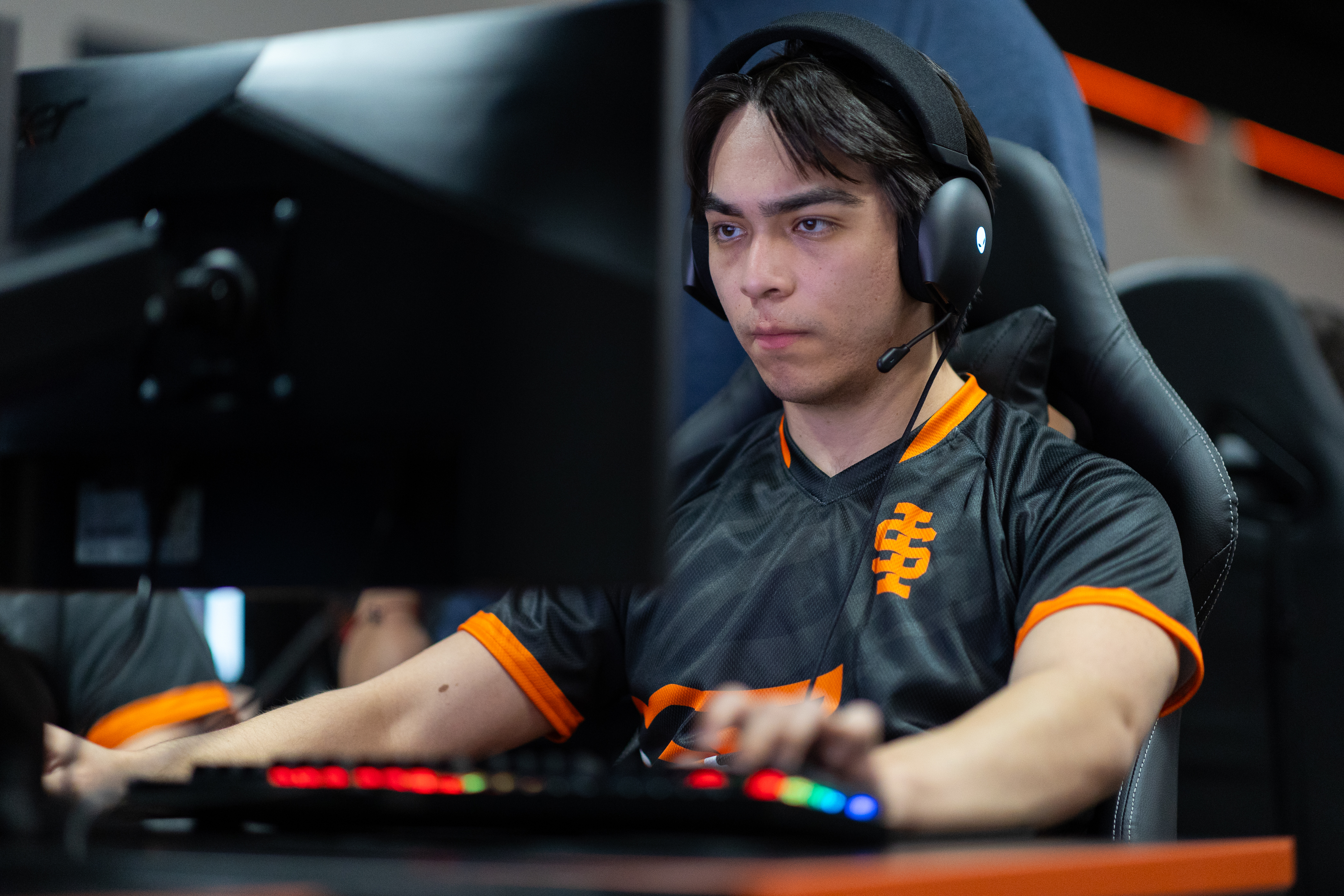 A student is seen on a computer in the ISU E-sports arena