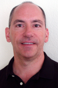 The College Welcomes John Gribas as New Associate Dean