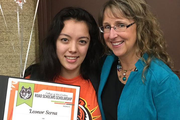 Leonor Serna receives Road Scholarship from Kandi Turley-Ames.