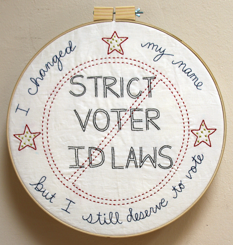 An embroidery hoop reading 