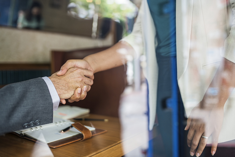 Two people shaking hands