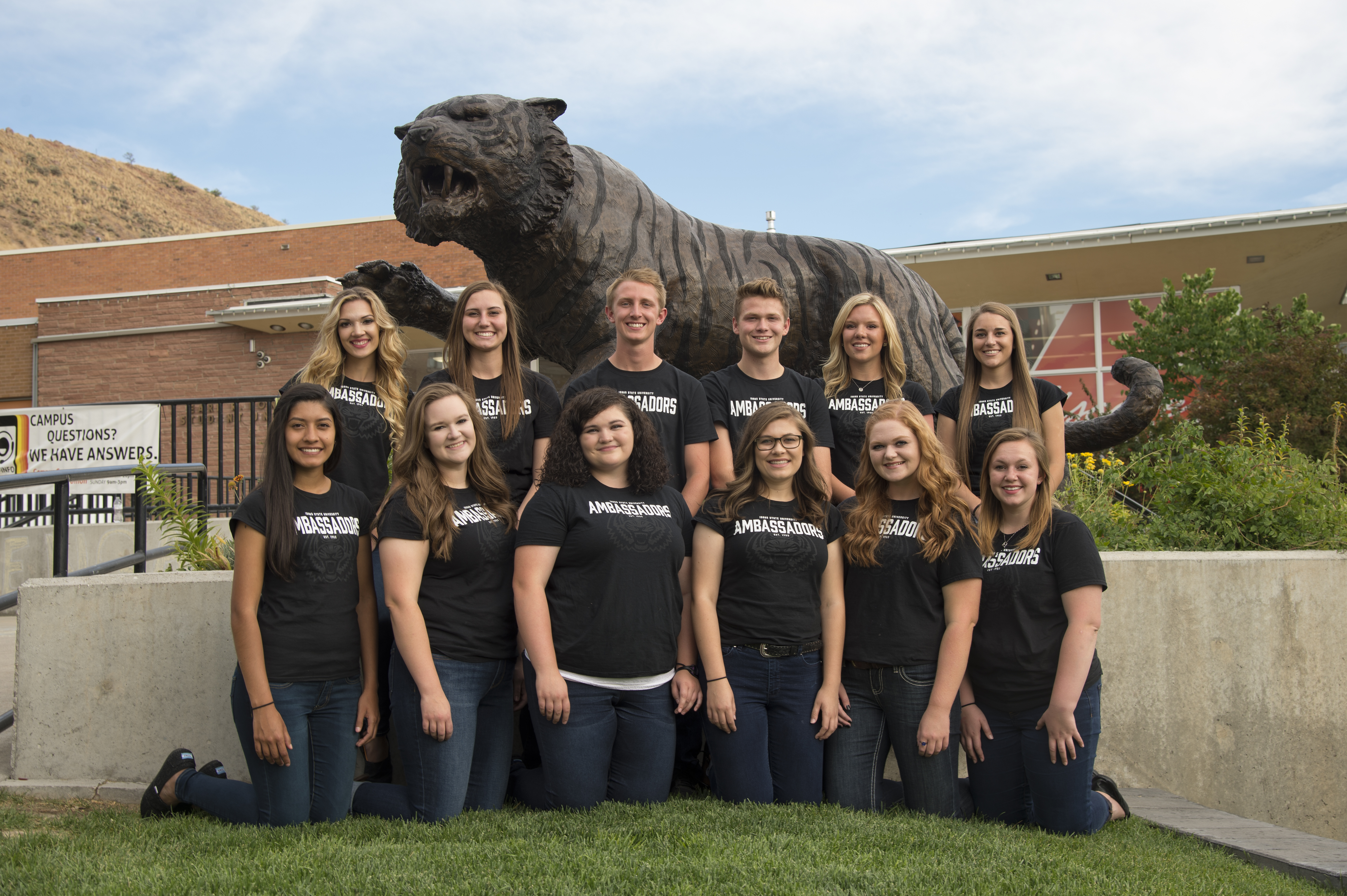 Group of student ambassadors in front of the Bengal statue