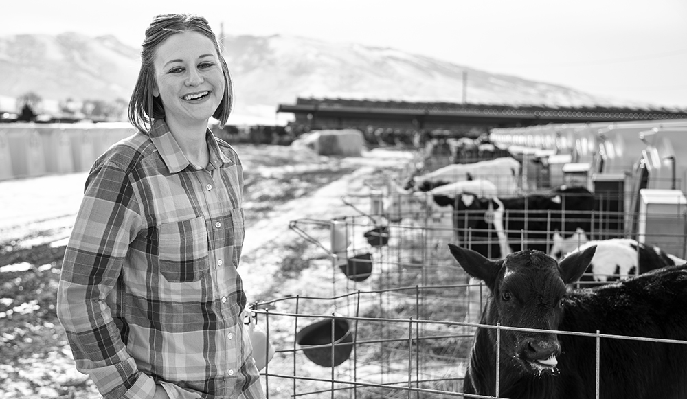 Student with a cow