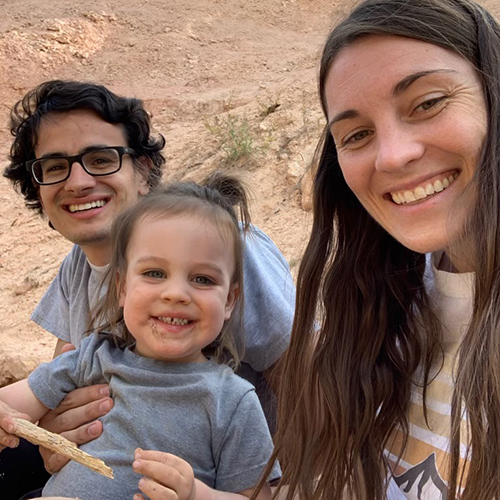 Family posing outside