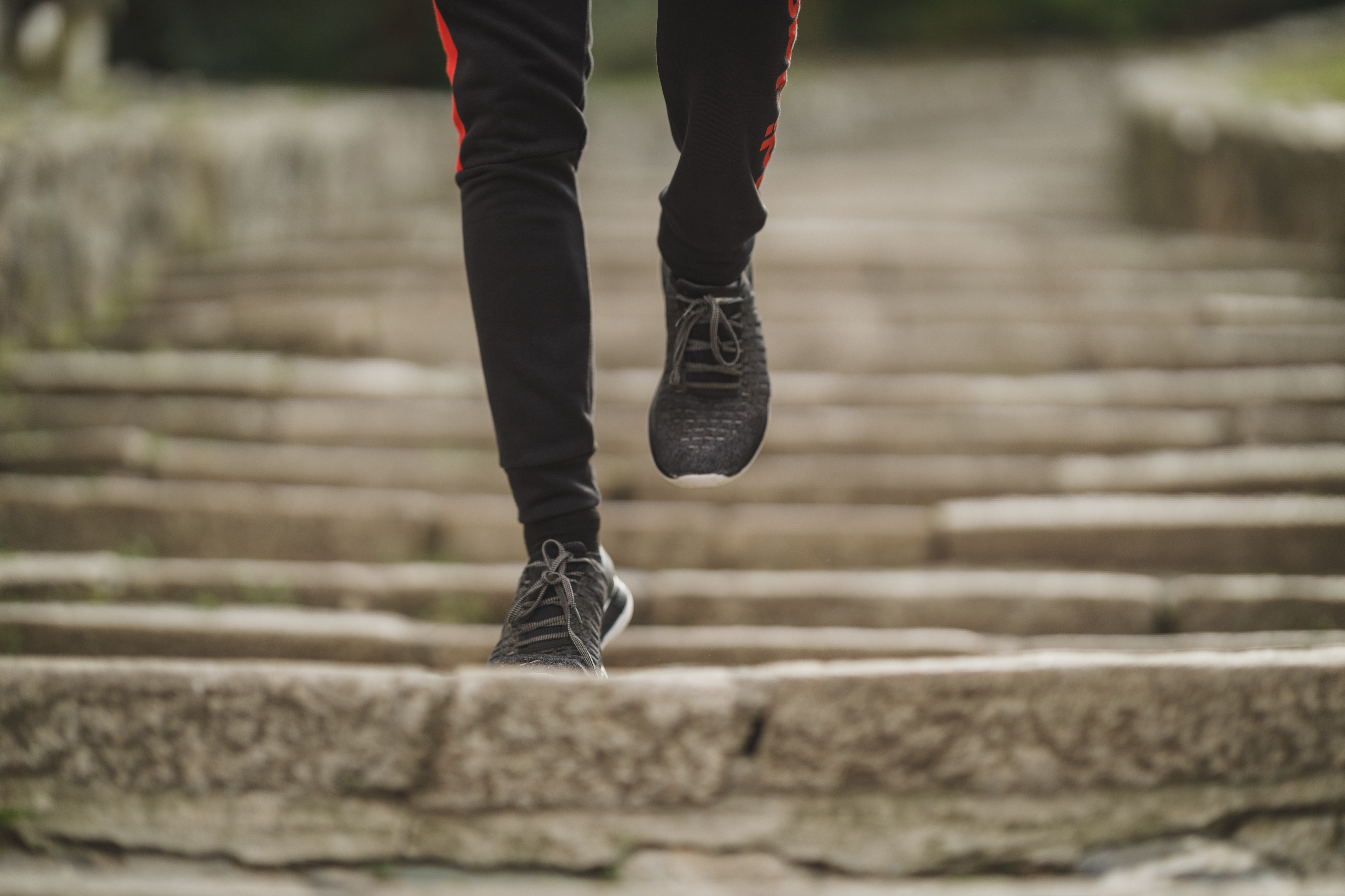 Student jogging up stairs