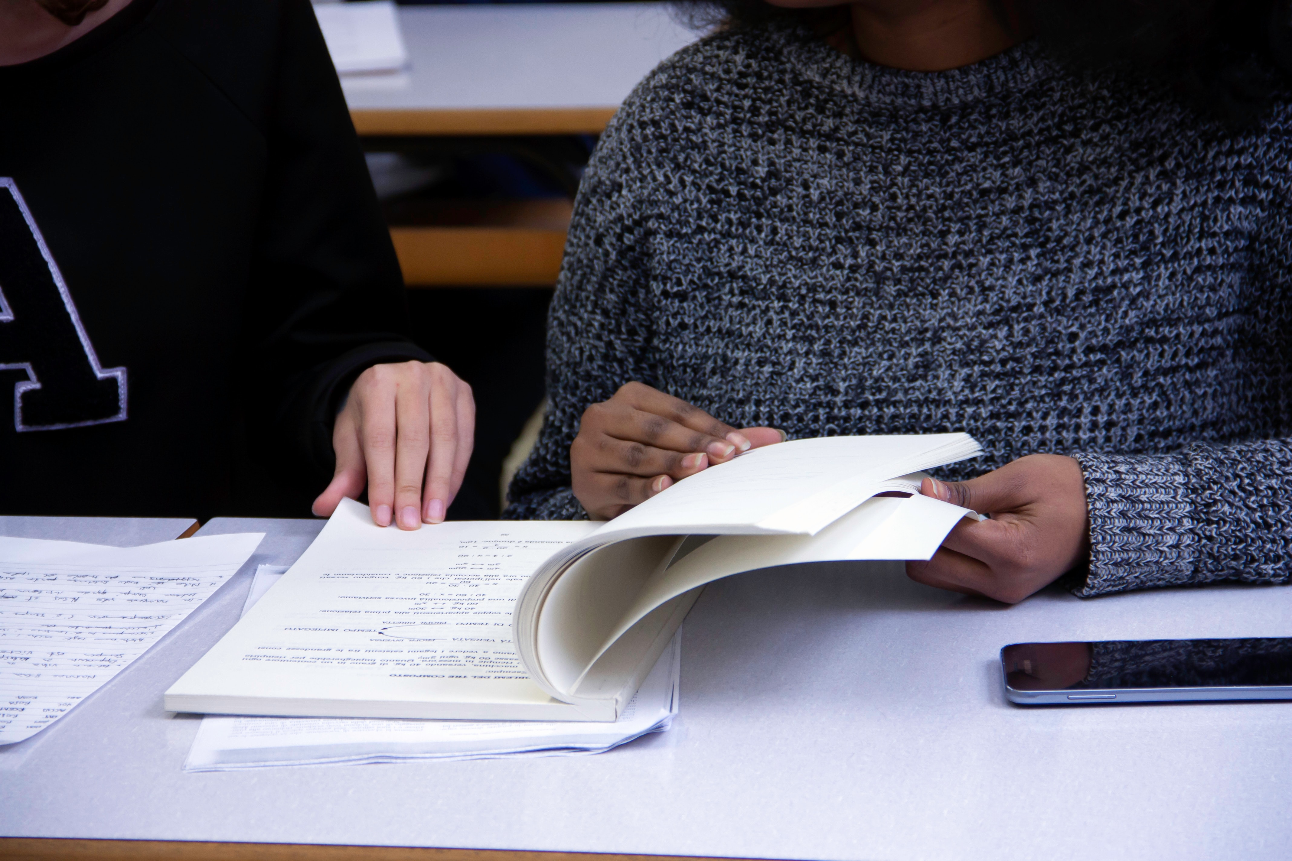 Two students studying for a test