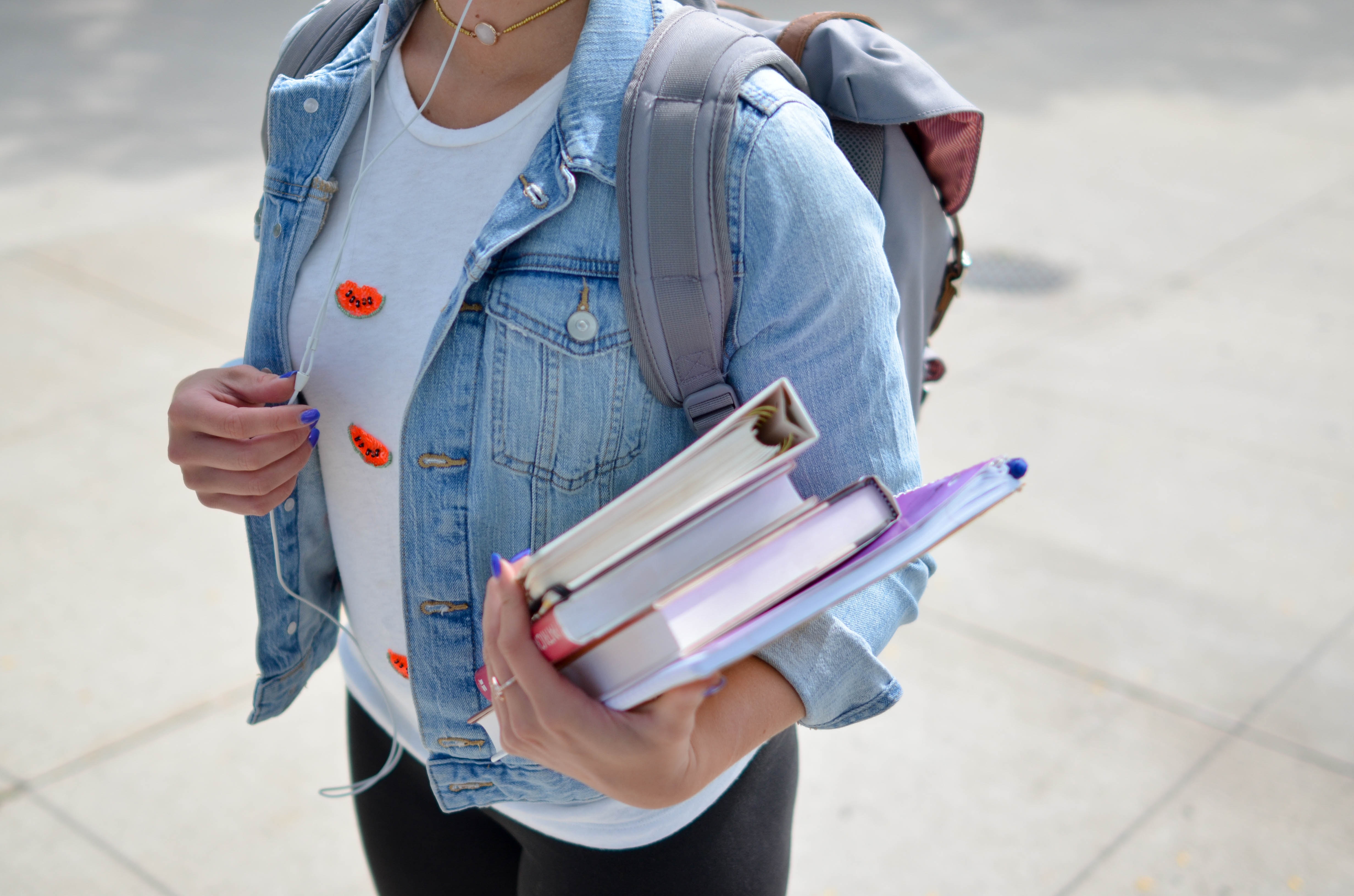 Student holding textbooks