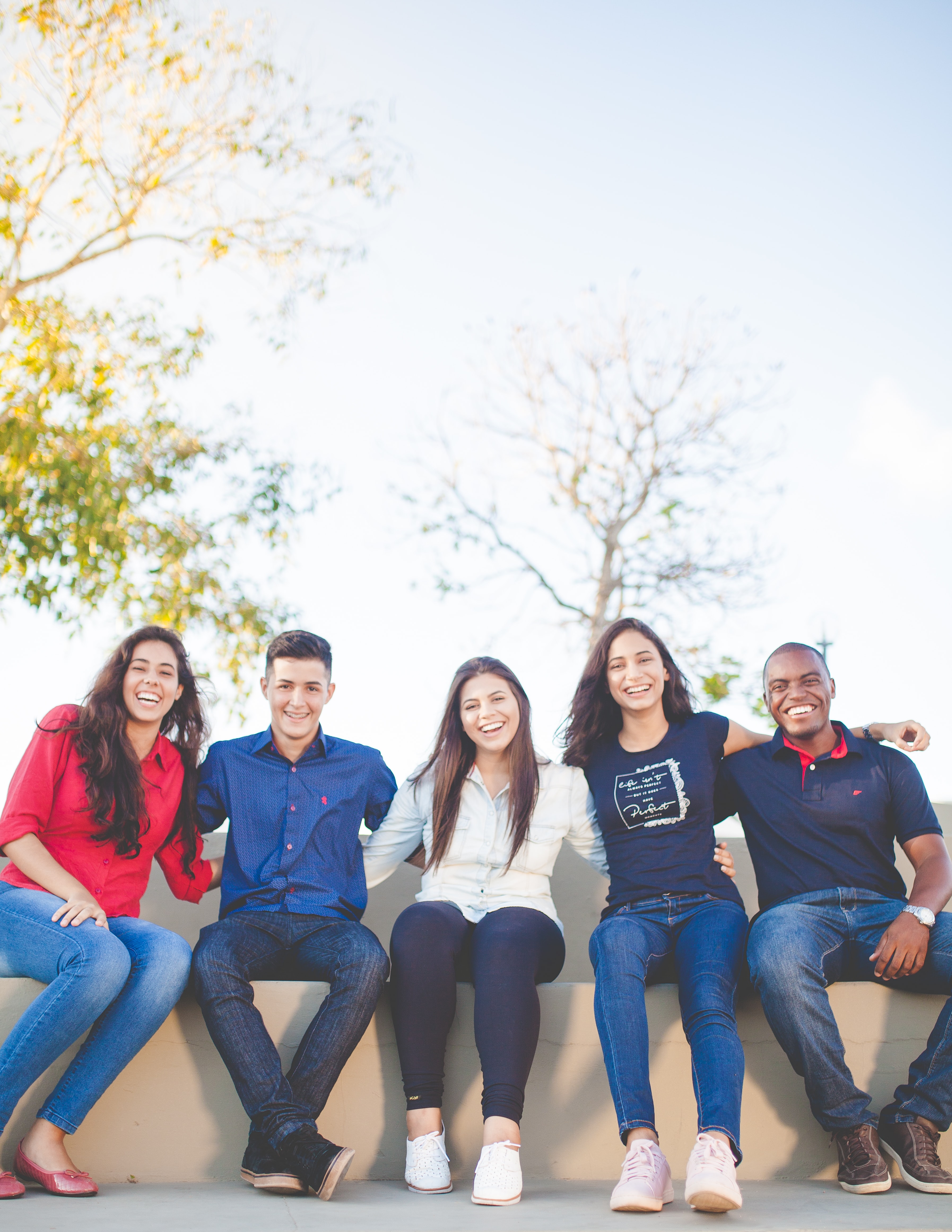 Students sitting together outside