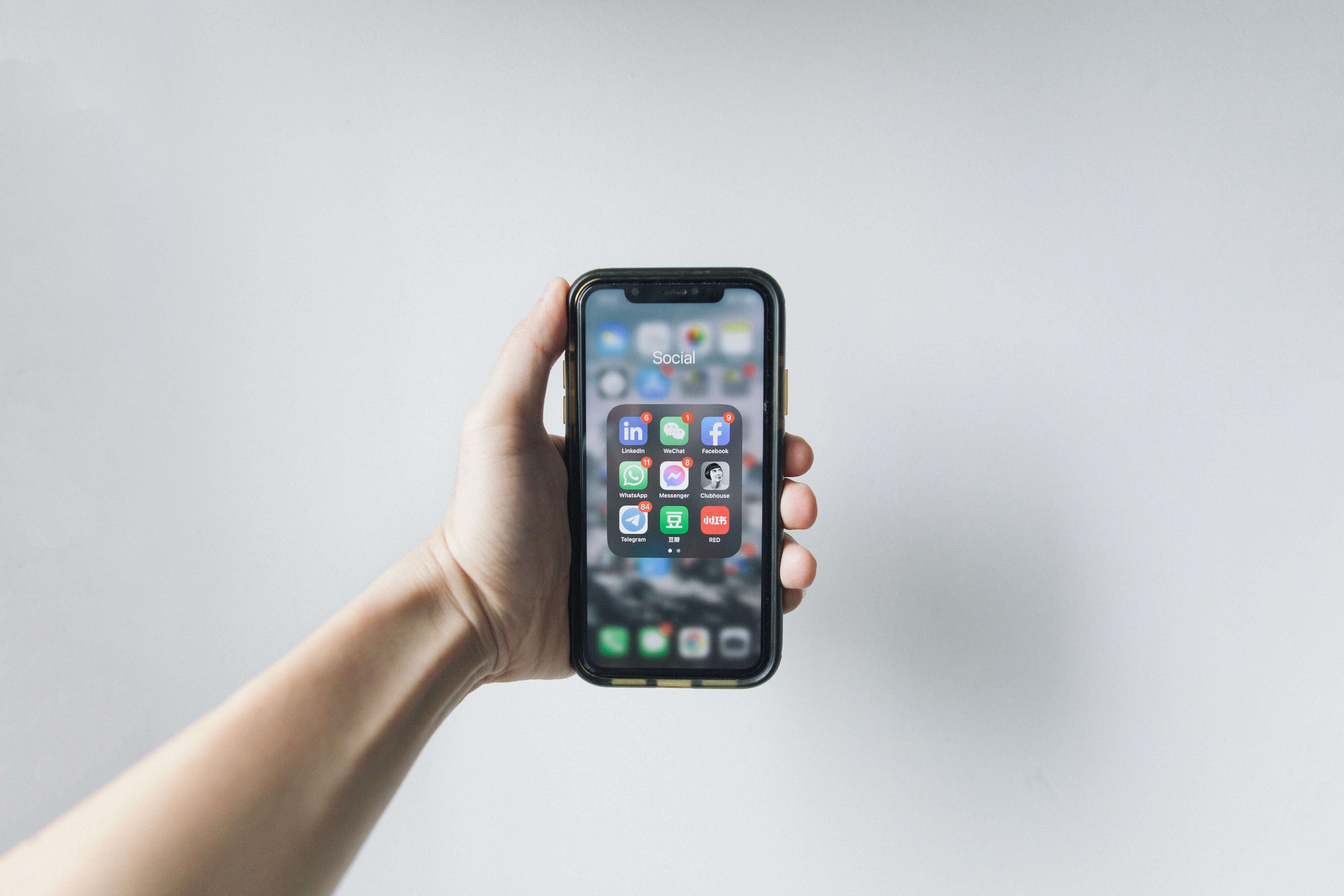 Person holding up a phone