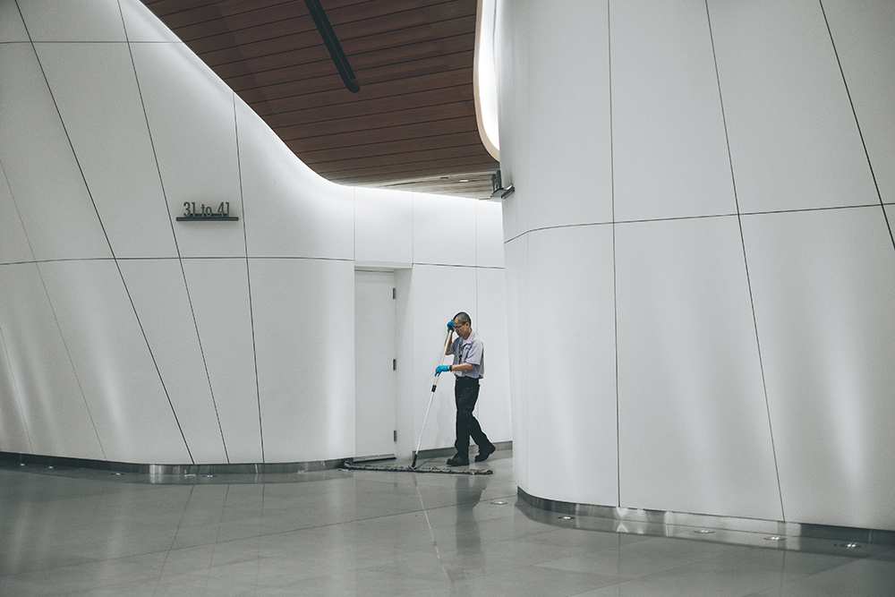 Person walking down a hallway