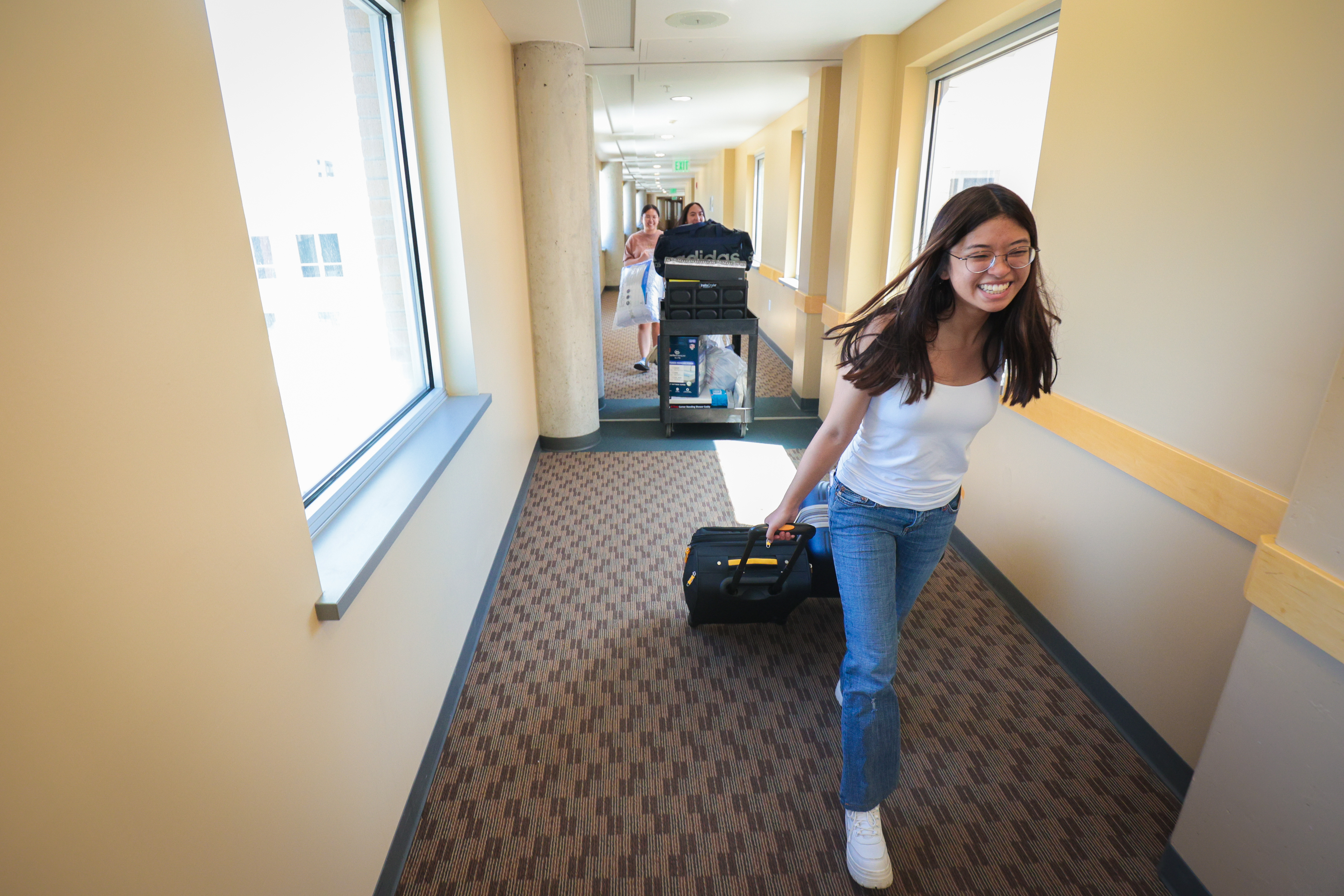 A group of students moving into their dorms