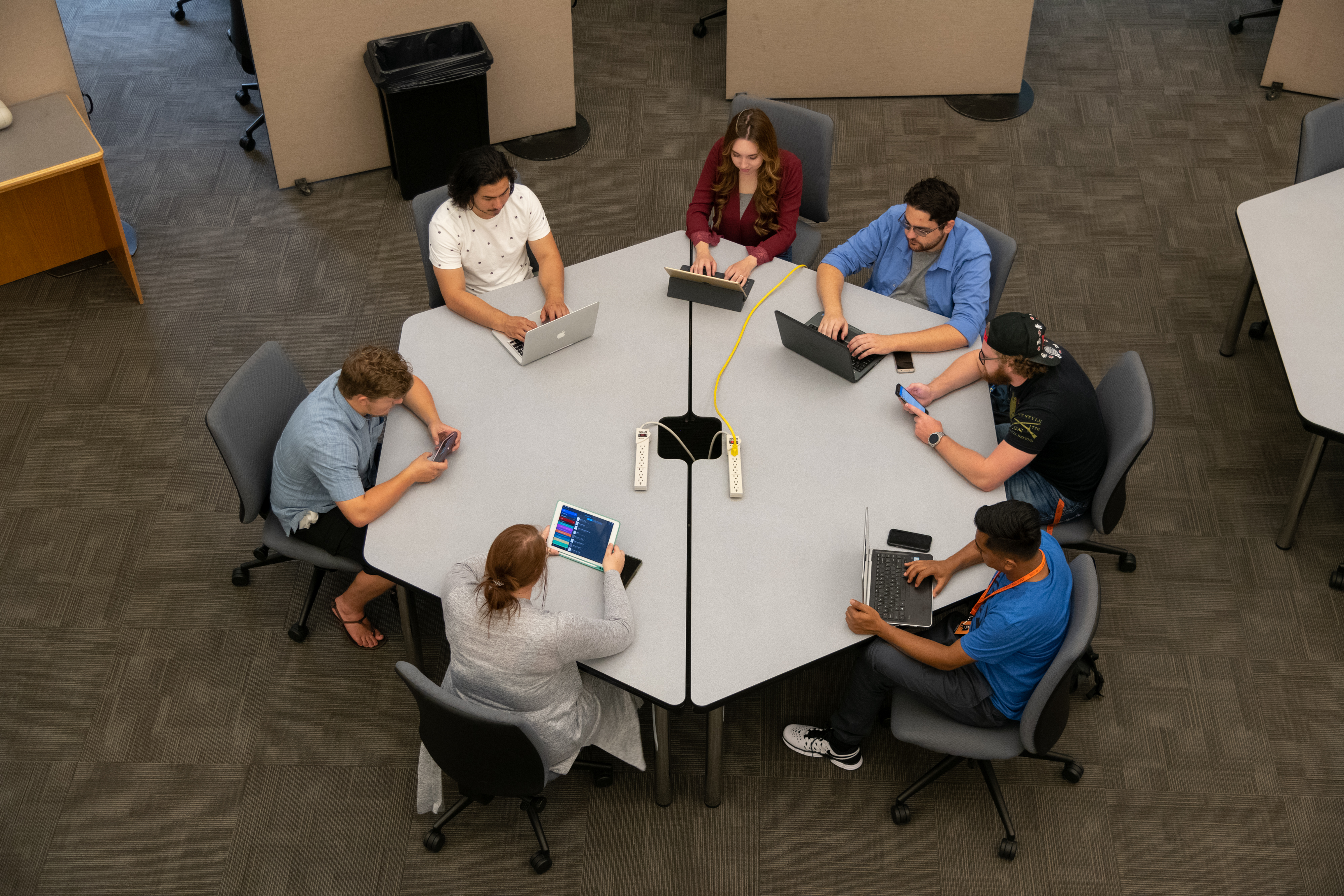 ISU Students meet around a table