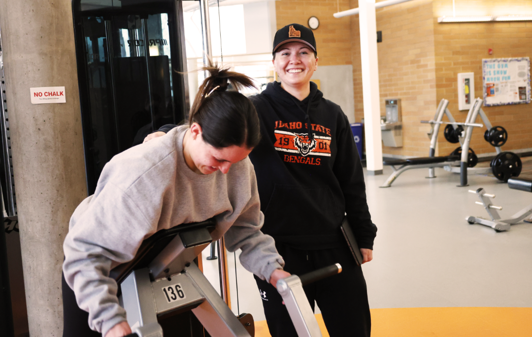 Students in Reed Gym doing workout activities