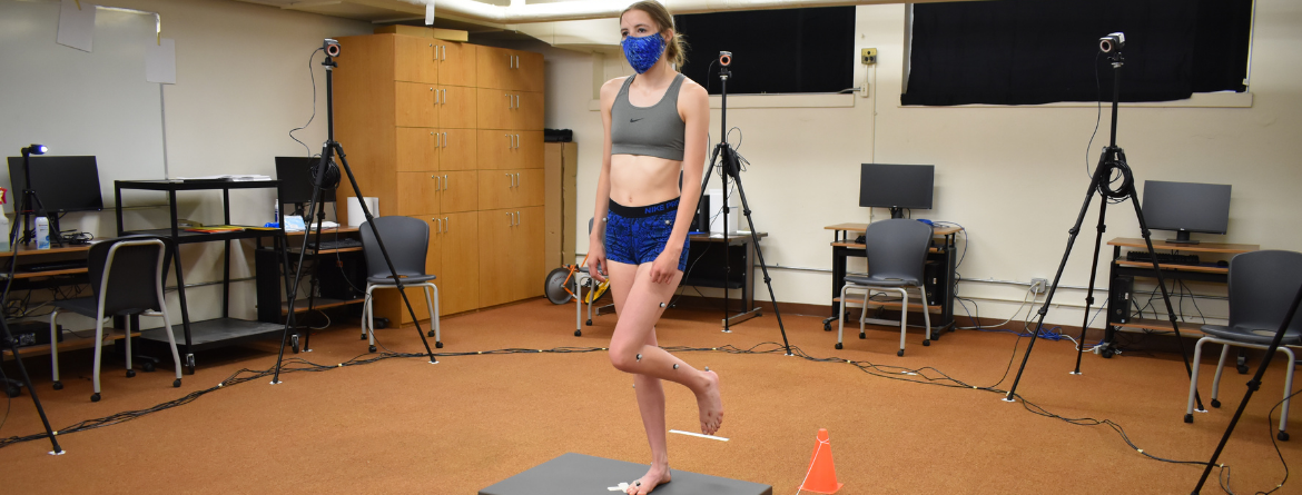 student being analyzed with her movements for biomechanics lab