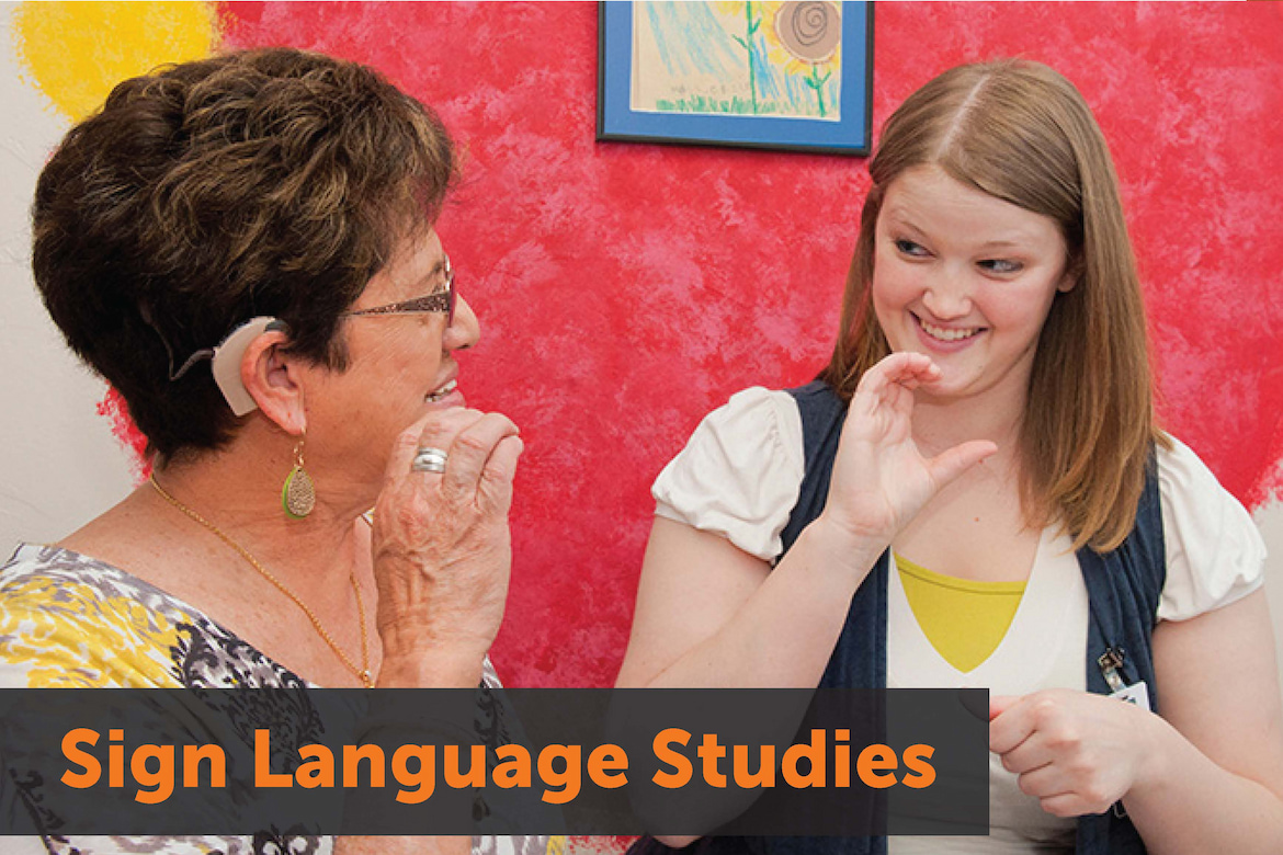 Two women communicating with sign language. Text: Sign Language Studies. Links to sign language studies homepage.