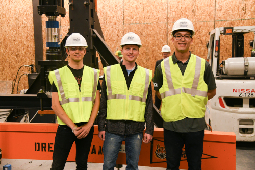 Dream Beam team standing in front of their beam