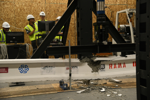 Beam being stress tested by the students that designed it. 