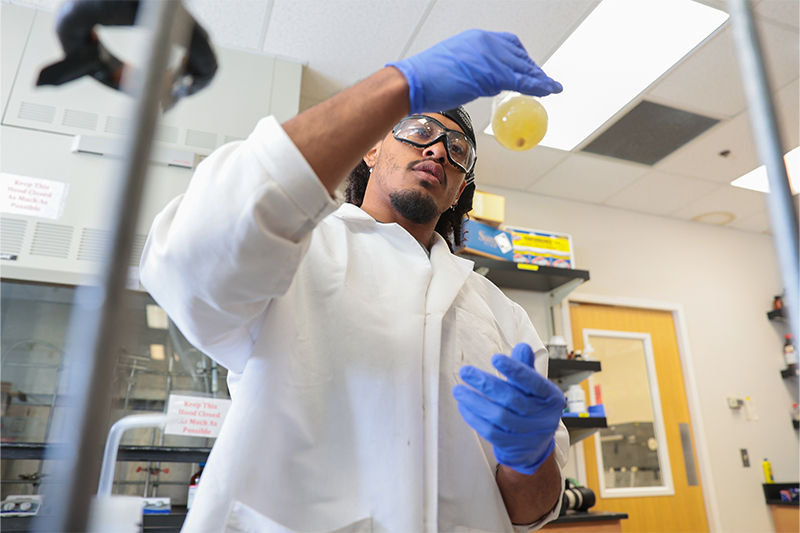 Raiden Hunter, a C-SURF participant works on a project at Idaho State University.