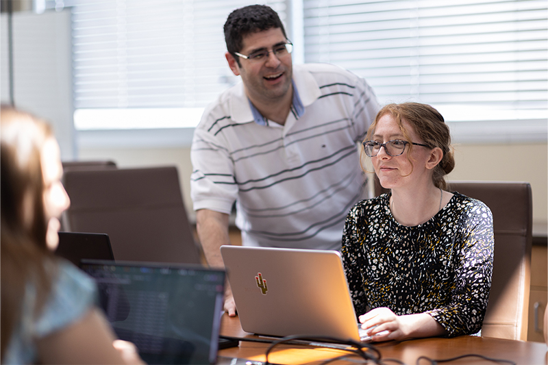 Pedro “Pepo” Mena, left, and Samantha Ross work together at the Center for Advanced Energy Studies (CAES) in Idaho Falls, Idaho.