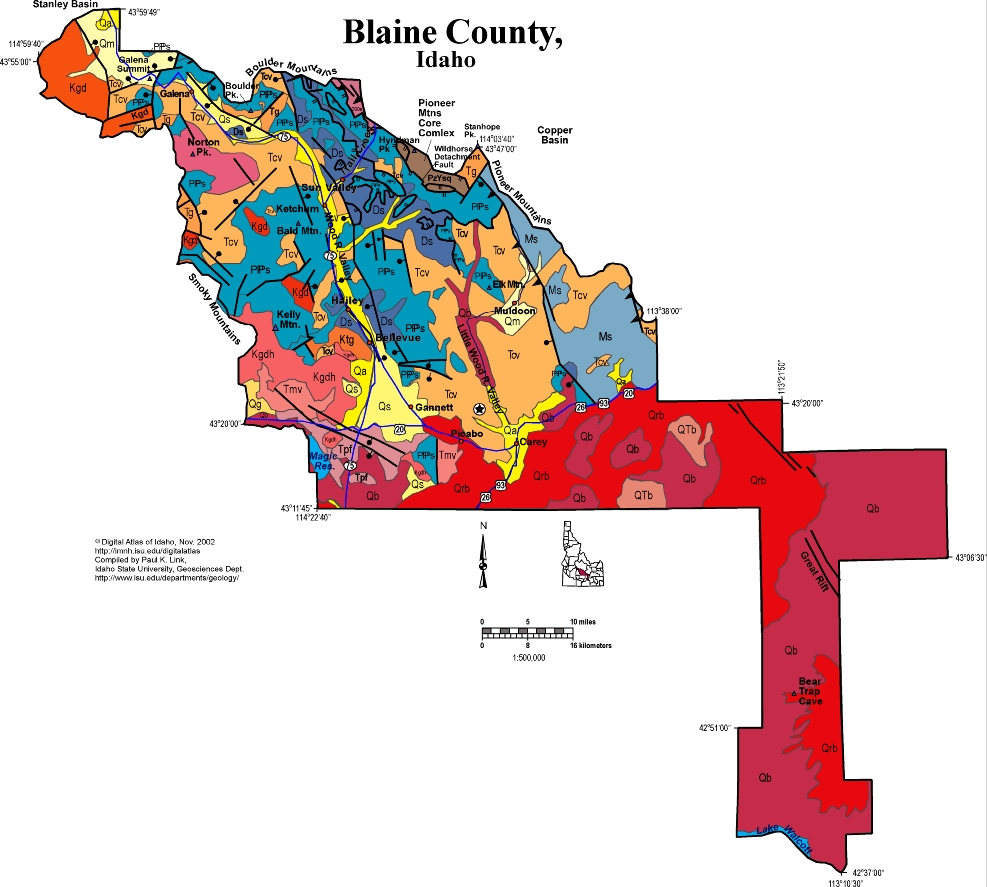 Geological map of Blaine County, Idaho, showing rock units, mountain ranges, volcanic flows, faults, and towns.
