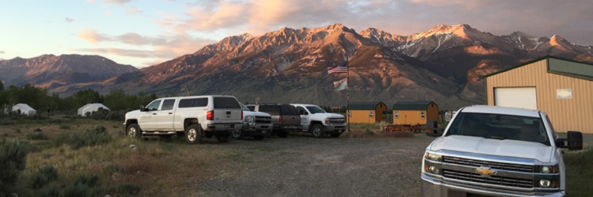 LRFC sunset with trucks in the foreground