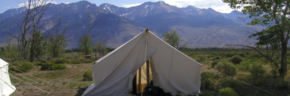 Tent in front of mountain range