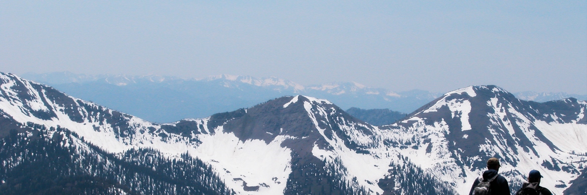 Students looking out onto a snowy mountain range