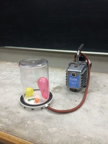 Balloon in a vacuum chamber