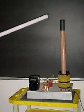 A fluorescent tube next to a tesla coil