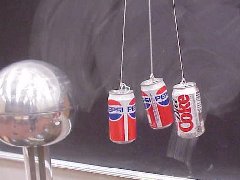 Pop cans near a vandegraff