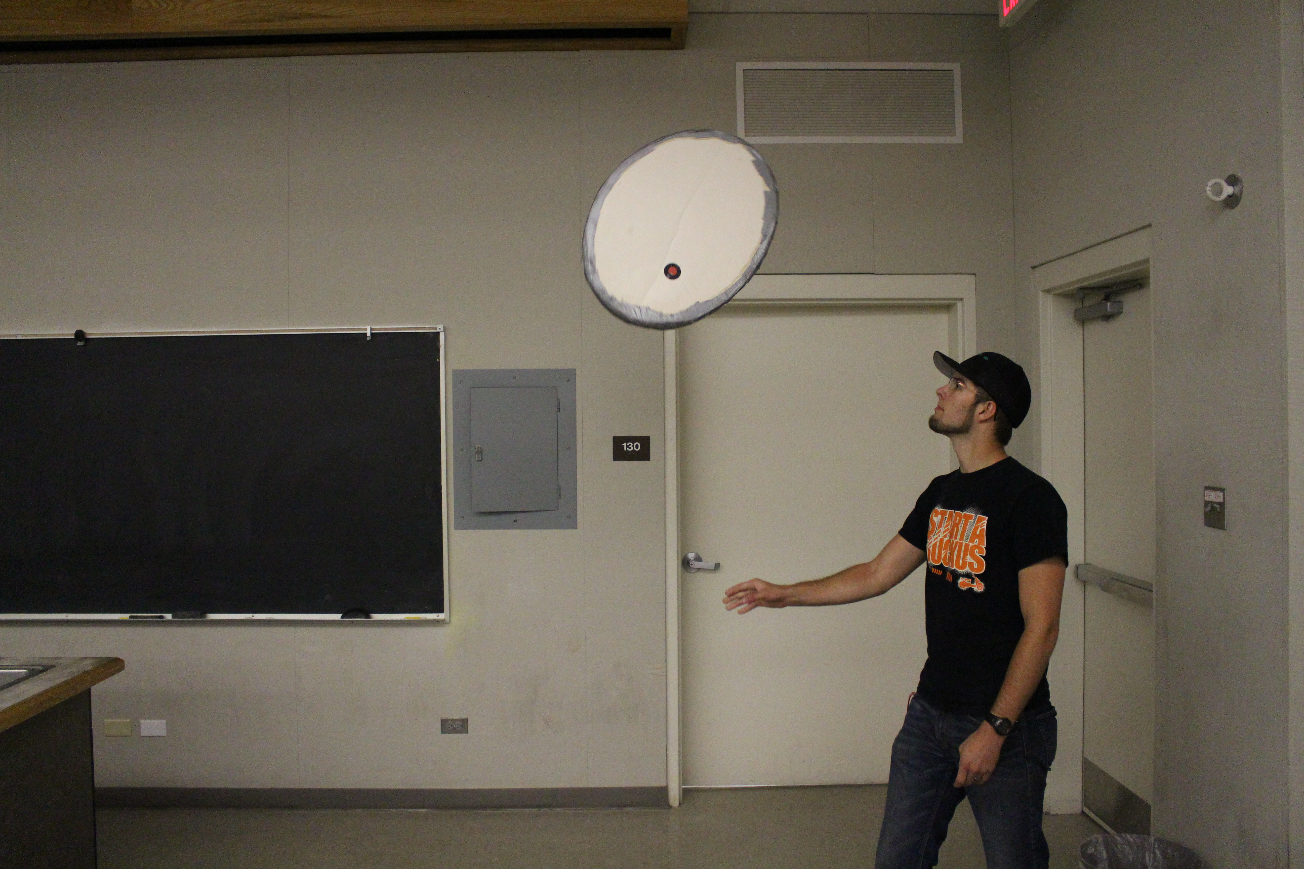 A foam ellipse being thrown in the air