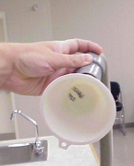 A ping pong ball in a funnel