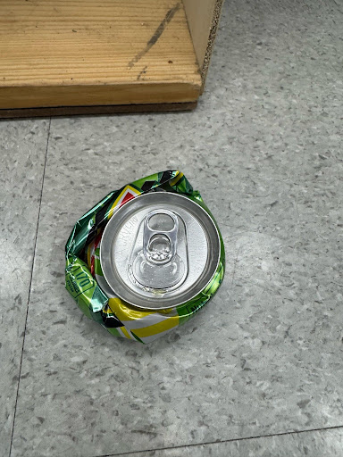 Can thats crushed as a result of the pile driver on the floor