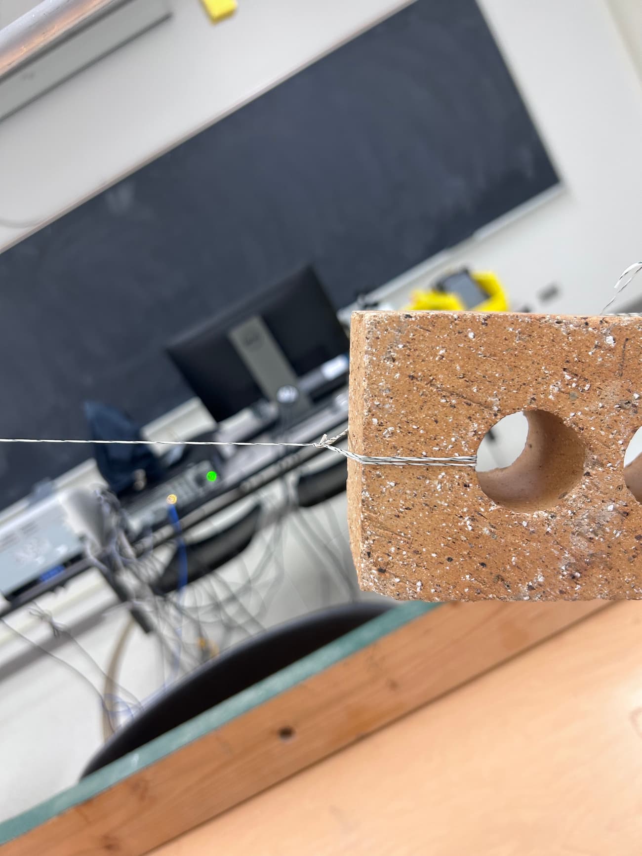 String parallel to surface for suspended brick demo.