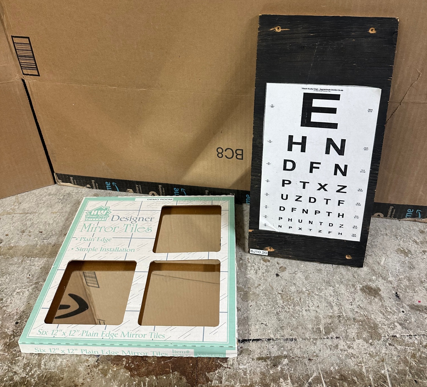 An eye chart and a box of plane mirrors